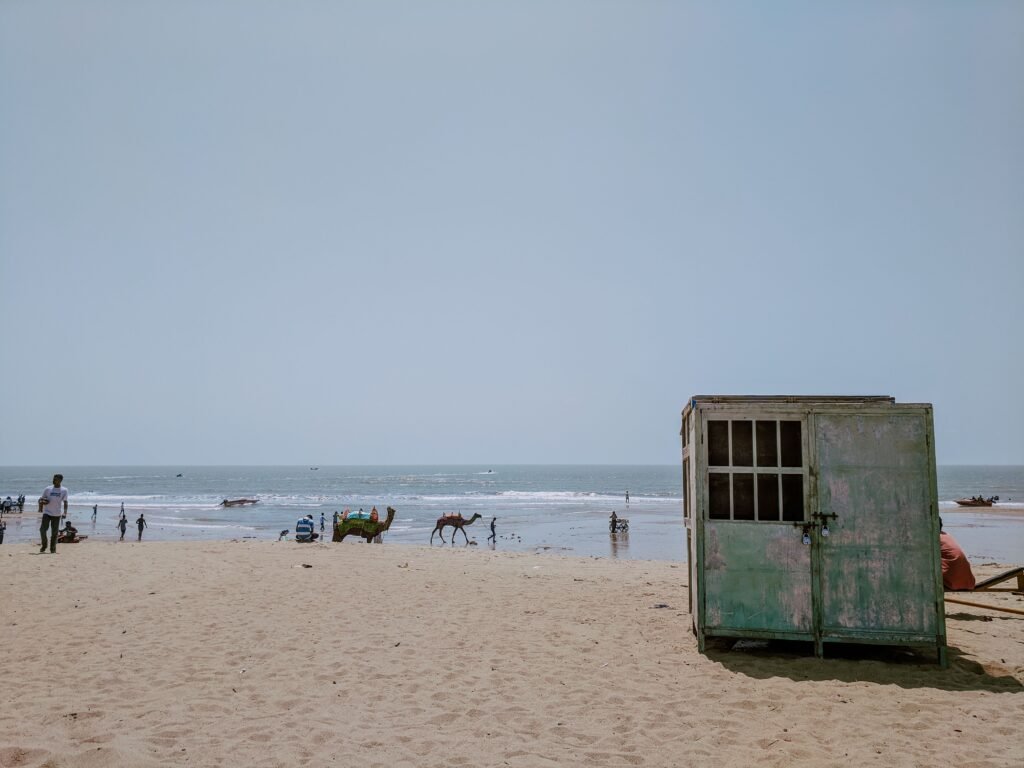 Mandvi, Kutch, is a charming beach city known for its golden shores, historic Vijay Vilas Palace, traditional shipbuilding, and vibrant coastal culture.